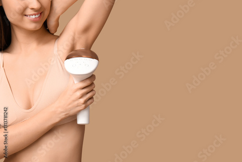 Young woman with modern pho...