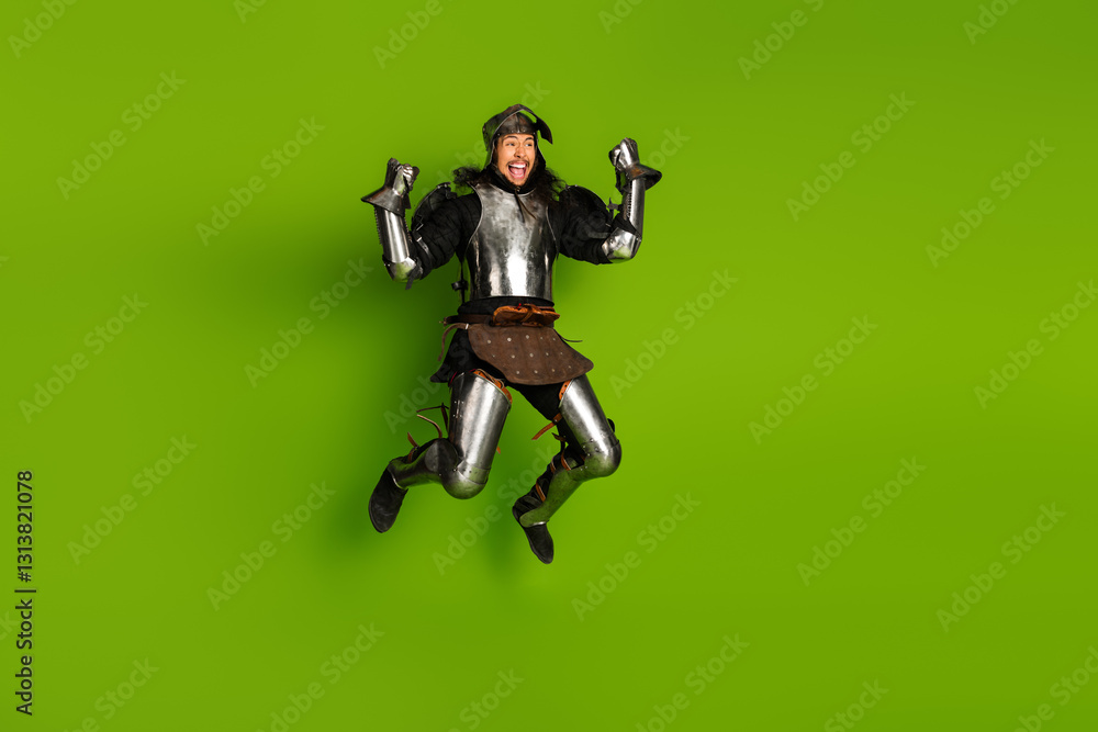 Ταπετσαρία Energetic medieval knight jumping joyfully against a vibrant green background