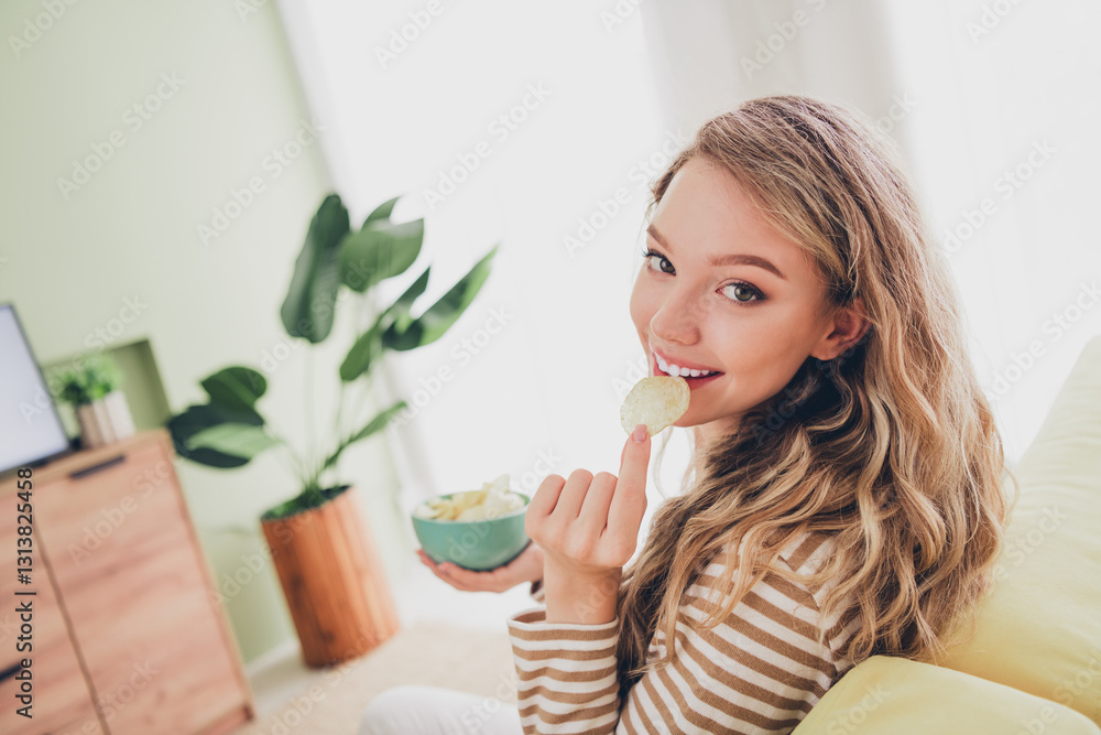 Young woman enjoying a relaxing weekend at home in daylight indoors Young woman enjoying a relaxing weekend at home in daylight indoors
