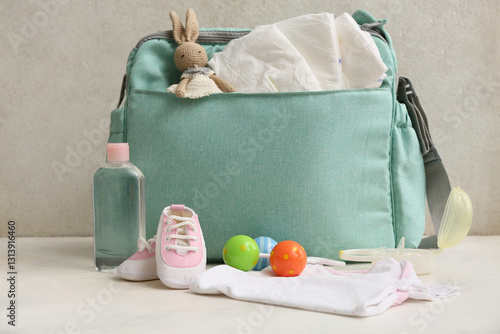 Baby bag with rattle on tab...