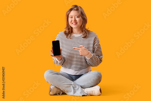 Young woman using mobile ph...