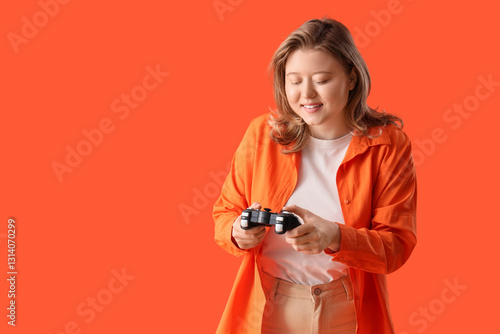 Young woman with game pad o...