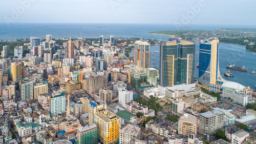 A breathtaking aerial drone shot of Dar Es Salaam, capturing the city's vibrant skyline, bustling streets, and coastal beauty. Perfect for travel, urban, and technology themes