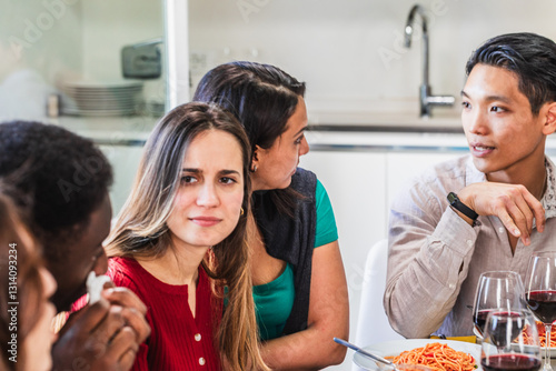 Fotografia Woman feeling uncomfortable during lunch with friends