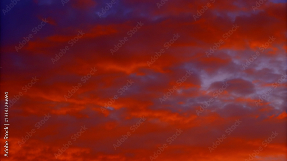 Vibrant Sunset Cloudscape with Fiery Hues Vibrant Sunset Cloudscape with Fiery Hues