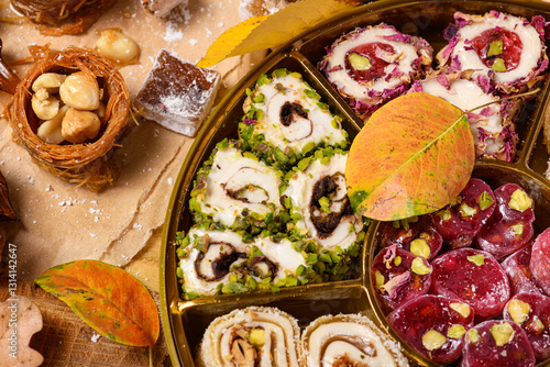 Sweet food Turkish delight on wooden background, assorted locum and candy for decorated backdrop photo