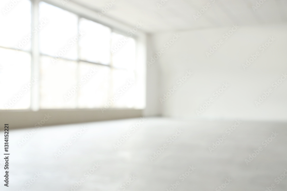 Fototapeta premium Blurred view of big empty room with large window