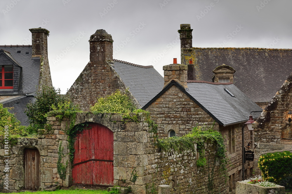 Black slate gable roofs and rear courtyard walls of granite ashlar buildings from the XVII-XVIII centuries, Rue du Four. Locronan-Brittany-France-324 Black slate gable roofs and rear courtyard walls of granite ashlar buildings from the XVII-XVIII centuries, Rue du Four. Locronan-Brittany-France-324