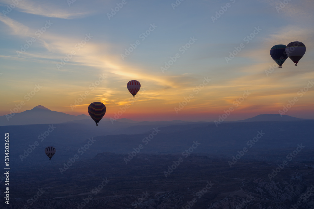 Hot air balloons at sunrise in Goreme, Cappadocia, Turkey