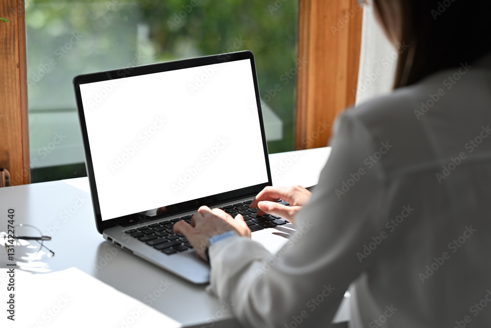 A close-up of a professional businesswoman hands typing on a laptop in a bright, modern workspace near a window, Focused Work in a Peaceful Setting A close-up of a professional businesswoman hands typing on a laptop in a bright, modern workspace near a window, Focused Work in a Peaceful Setting