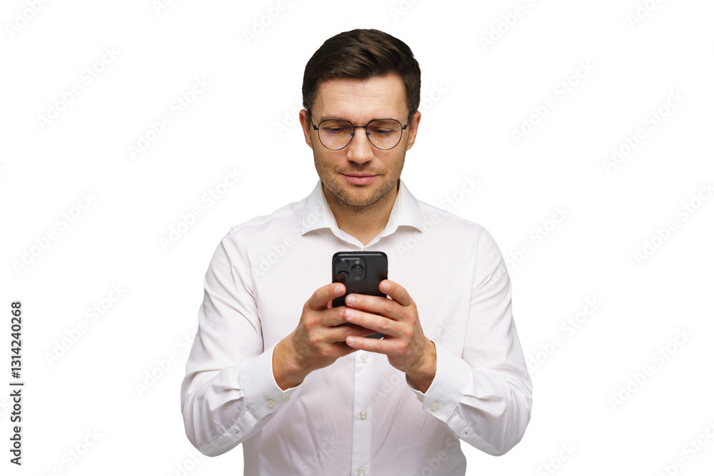 Man in white shirt uses smartphone while smiling, engaged in digital communication indoors Man in white shirt uses smartphone while smiling, engaged in digital communication indoors