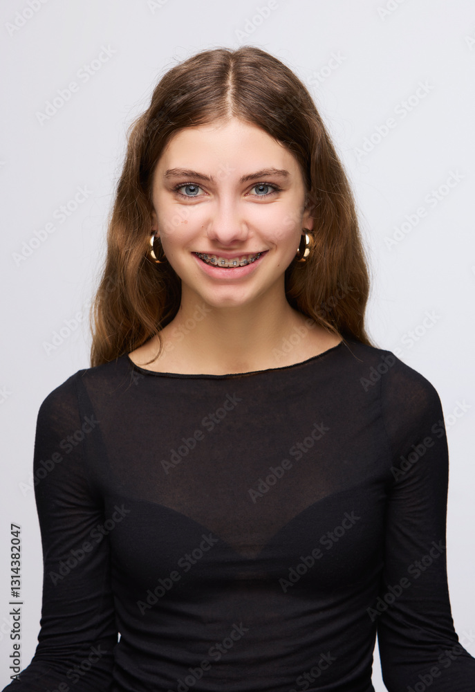 Portrait of teenage girl in a studio setting. Portrait of teenage girl in a studio setting.