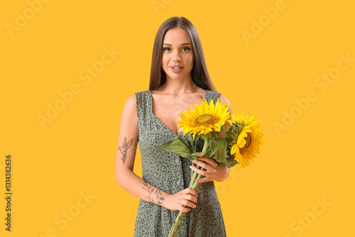 Young woman with bouquet of...