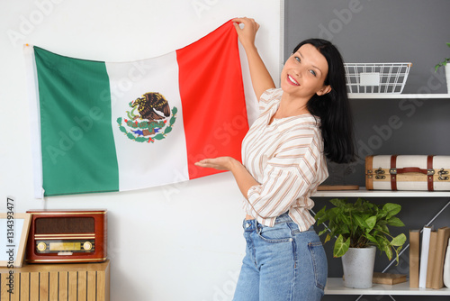 Young woman hanging Mexican...