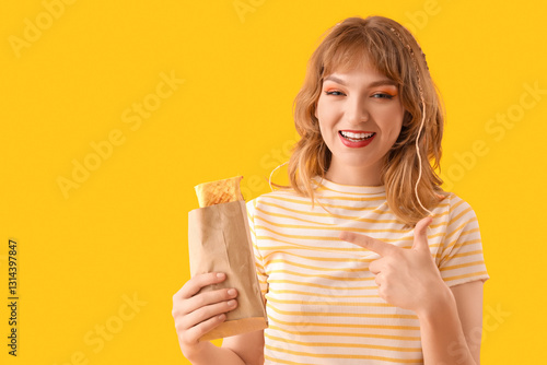 Young woman with tasty sand...