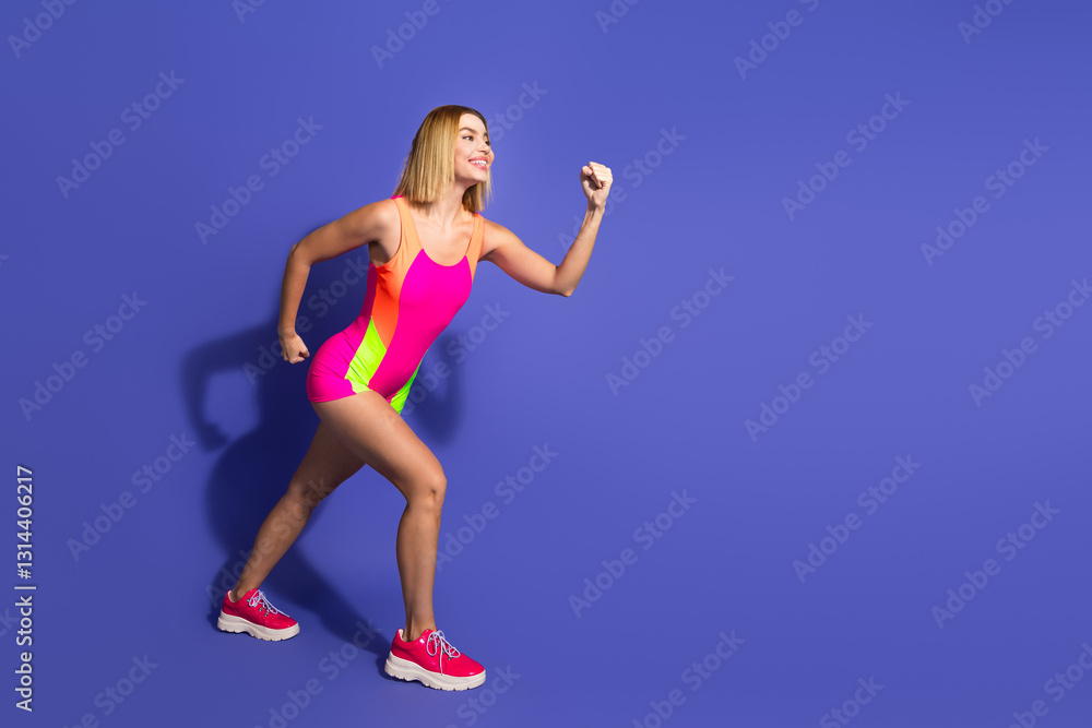 Stylish young woman in a colorful bodysuit posing energetically against a purple backdrop, embracing active and vibrant fitness lifestyle Stylish young woman in a colorful bodysuit posing energetically against a purple backdrop, embracing active and vibrant fitness lifestyle