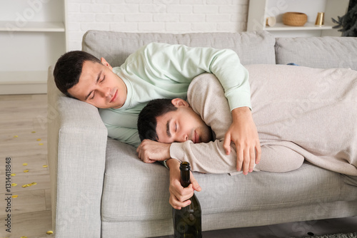 Drunk young men sleeping on...