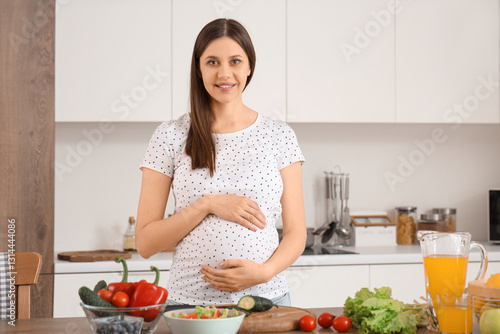 Beautiful pregnant woman co...