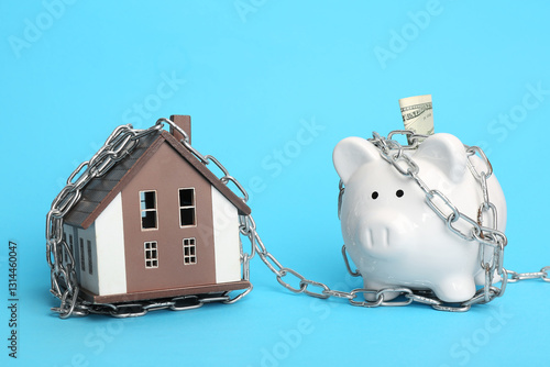 Model of house and piggy ba...