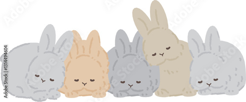 寄り添って眠るウサギたち