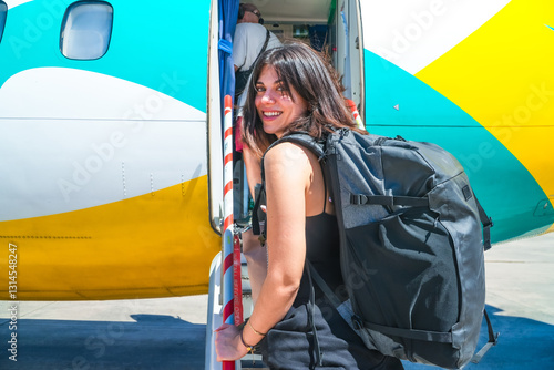 Cuadro en lienzo Tourist exiting airplane after landing in philippines airport