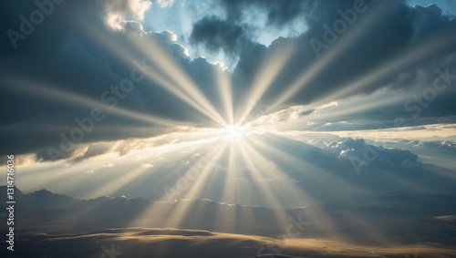 Fototapeta Naklejka Na Ścianę i Meble -  Beam of light shining through the clouds. Rays of light coming through clouds.