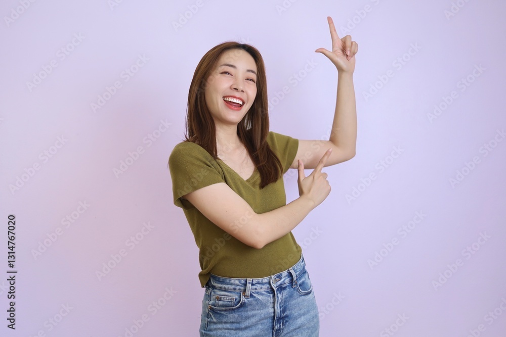 young woman pointing at something young woman pointing at something