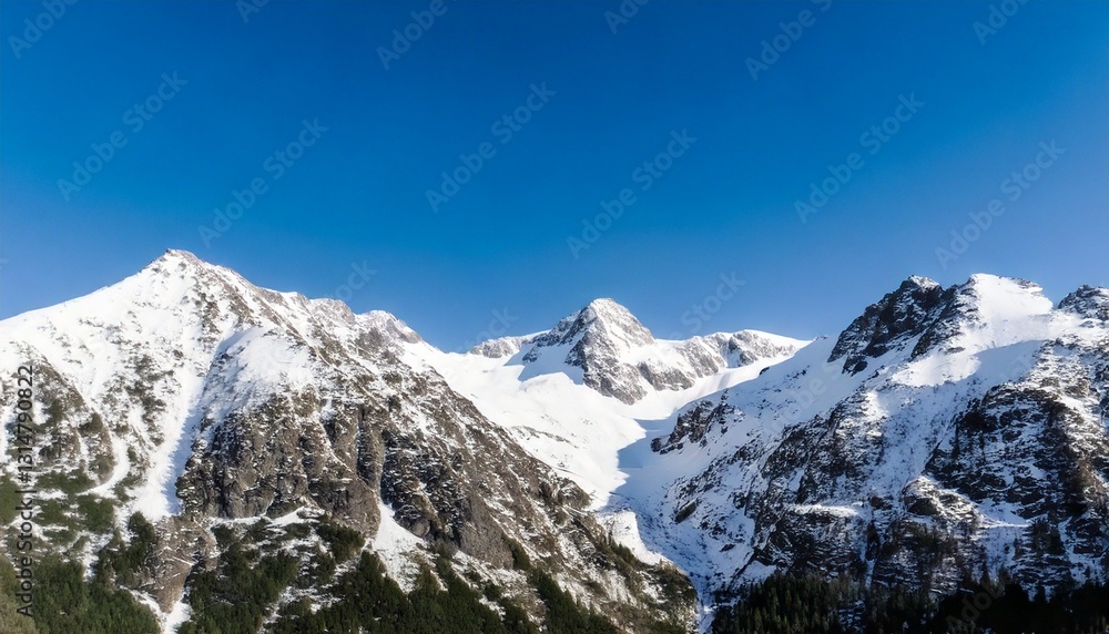 Photo of snowy mountain peaks with clear sky Photo of snowy mountain peaks with clear sky