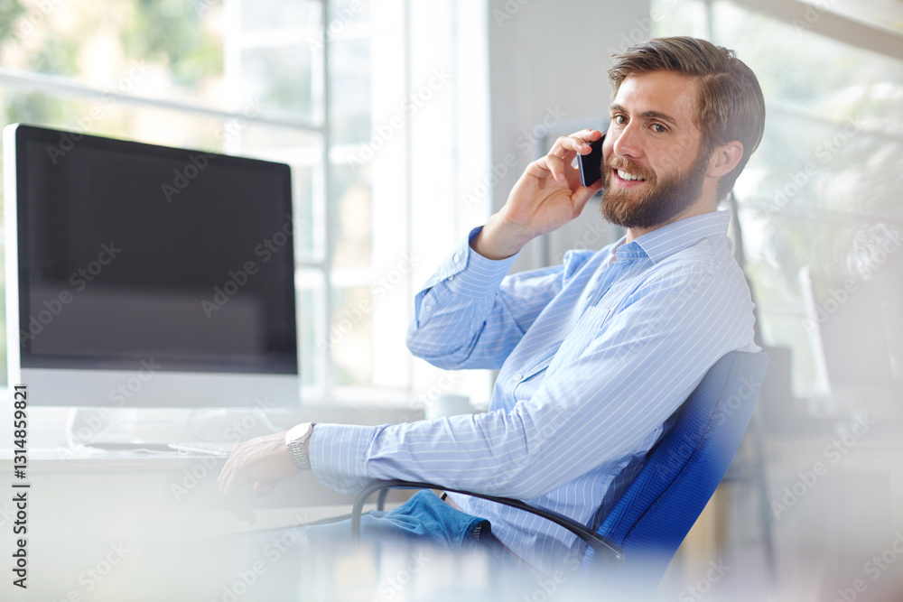Man, architect and phone call in office, worker and online for negotiation on design. Property, development and speaking with business client in workplace, project and computer for mockup screen Man, architect and phone call in office, worker and online for negotiation on design. Property, development and speaking with business client in workplace, project and computer for mockup screen