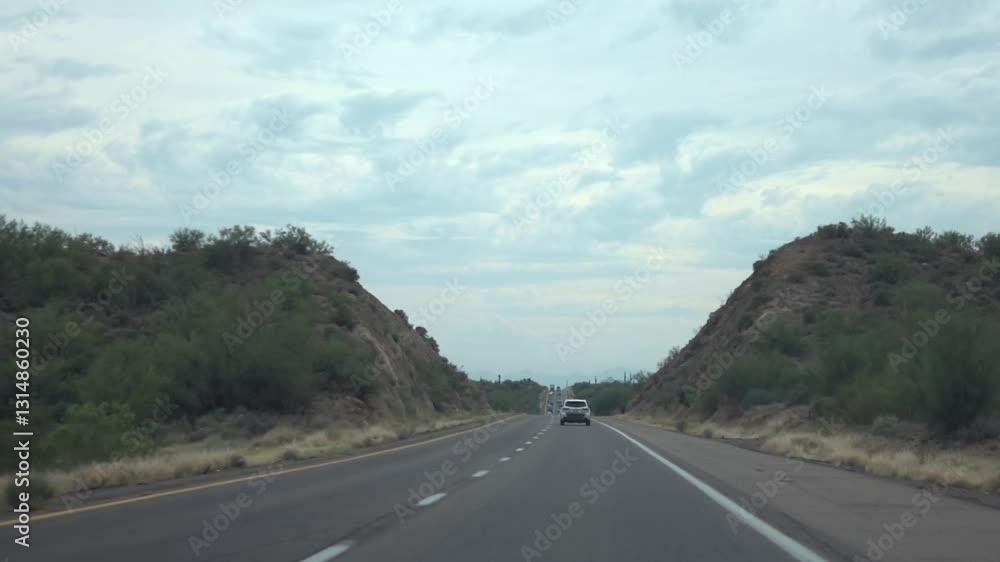 Driving through a mountainous area in Arizona with winding roads in slow motion 120fps Driving through a mountainous area in Arizona with winding roads in slow motion 120fps