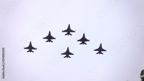 Six Fighter Jets Flying in Formation Against a Blue Sky in slow motion 120fps