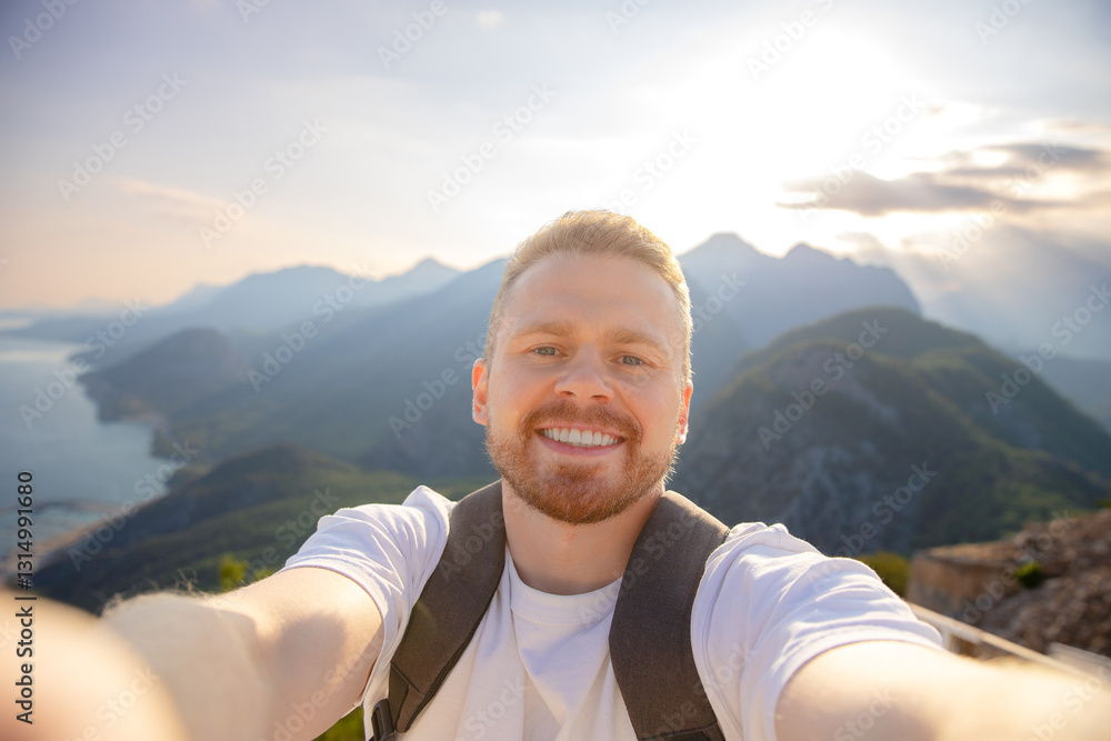 Fototapeta premium Male taking selfie on cable car in Antalya, turkey's scenic mountains Turkey