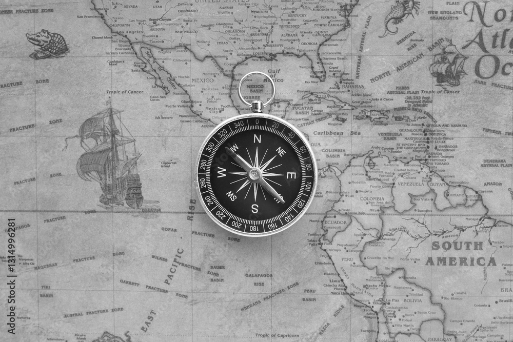 Fototapeta Classic round compass on background of old vintage map of world