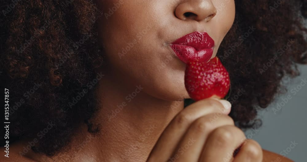 Strawberry, makeup and red lipstick with closeup of woman for glow, self care and vegan cosmetics. Shine, natural beauty and glamour with lips of person for aesthetic, fruit and cosmetology treatment Strawberry, makeup and red lipstick with closeup of woman for glow, self care and vegan cosmetics. Shine, natural beauty and glamour with lips of person for aesthetic, fruit and cosmetology treatment