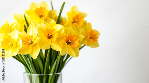 Wallpaper Mural Bright yellow daffodils arranged in a clear vase on a white background Torontodigital.ca