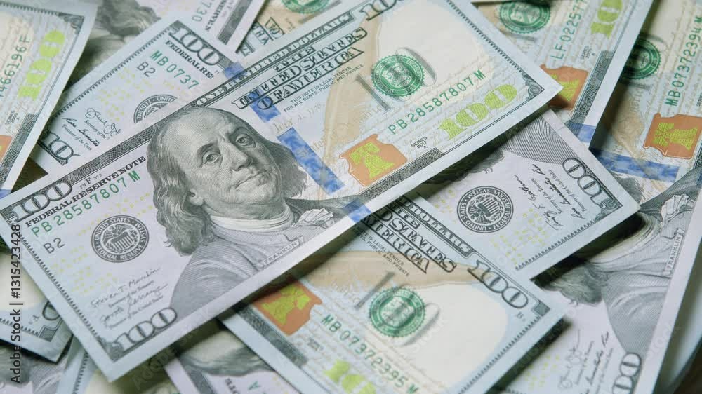 A visually appealing stack of United States Hundred Dollar Bills prominently showcased on display A visually appealing stack of United States Hundred Dollar Bills prominently showcased on display