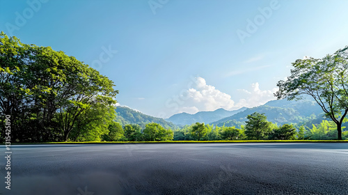 Asphalt Country Road Amidst Lush Green Trees Mountains Under Blue Sky with Fluffy White Clouds in Sunny Morning