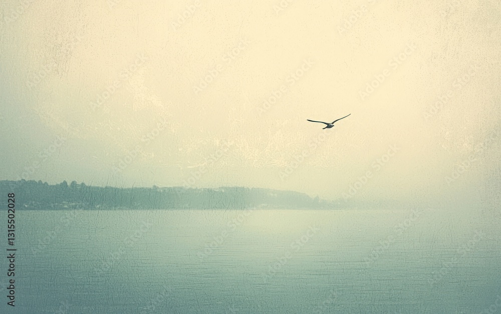 Fototapeta premium A small airplane flies over a calm body of water on a hazy day. The colors are muted greens, blues and beige. The scene is tranquil and serene