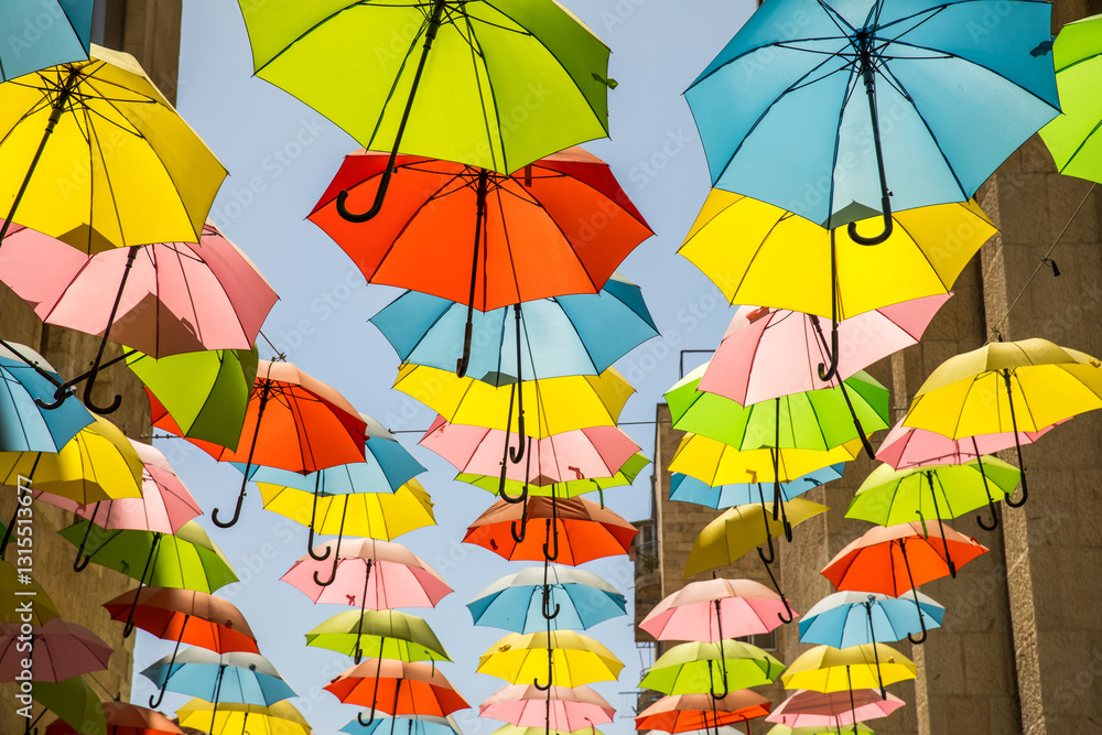 Obraz premium Colorful umbrellas above the street