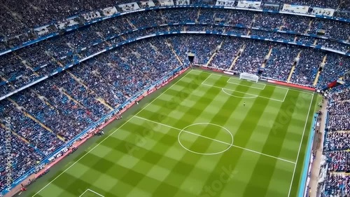 Soccer stadium filling up with fans during daytime