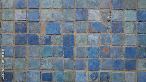 Old, broken blue tile floor