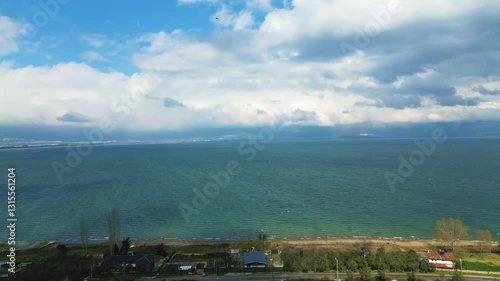 Wallpaper Mural Serene Drone Flight from Shore to Lake, Sky, Clouds  Tranquil Aerial Views in 4K Torontodigital.ca