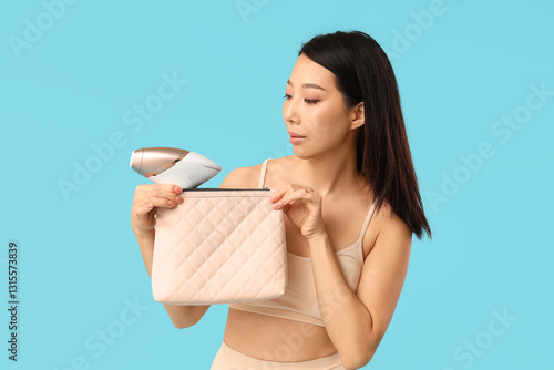 Pretty Asian woman with pho...