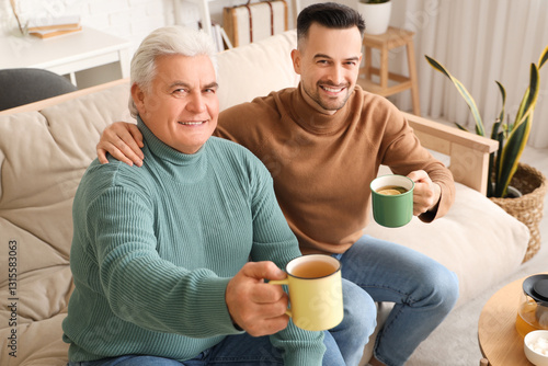 Young man with his father d...
