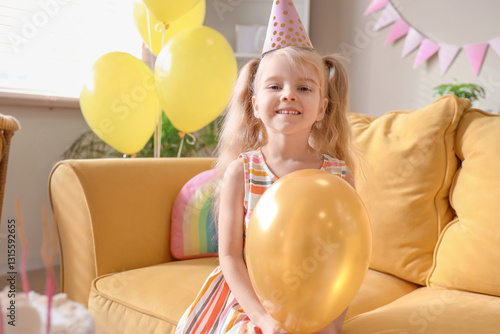 Happy little girl in party ...