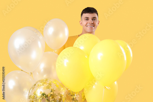 Young man with bunches of b...