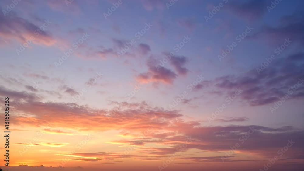 Sunset over the sea with vibrant clouds and warm colors in the sky Sunset over the sea with vibrant clouds and warm colors in the sky