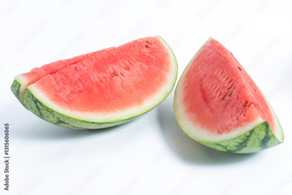 Fresh watermelon slices on a white background, close-up view. Fresh watermelon slices on a white background, close-up view.