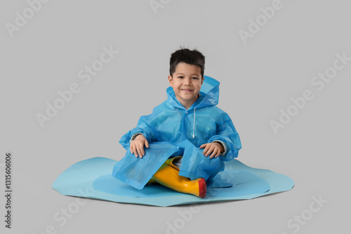 Cute little Asian boy with ...