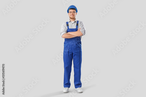 Male contractor on light ba...